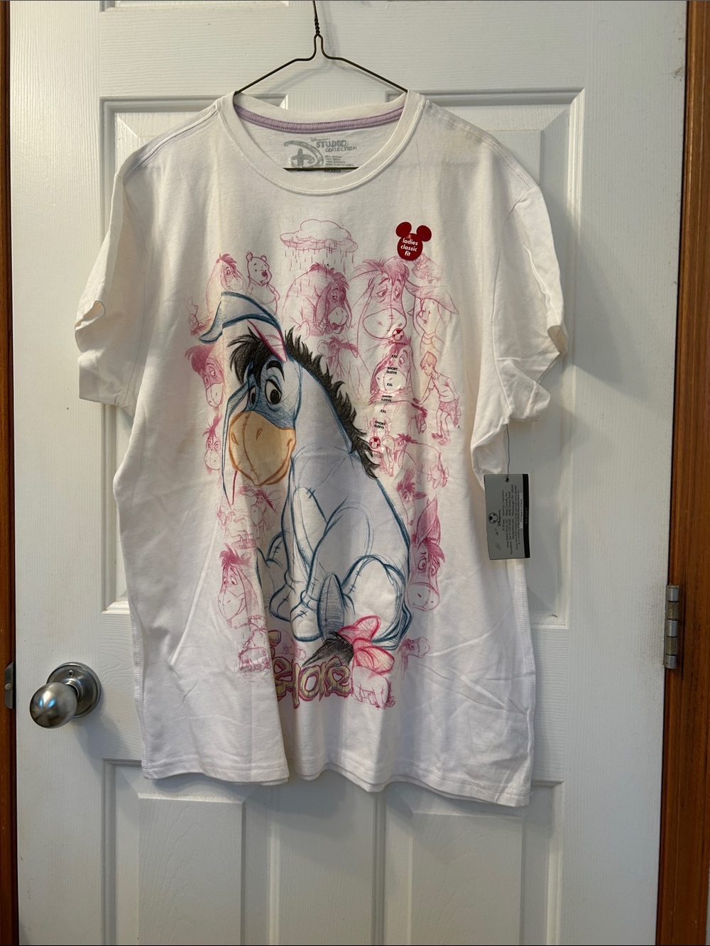 Disney White womans Tee with Eeyore Sketch Art and Pink Accents